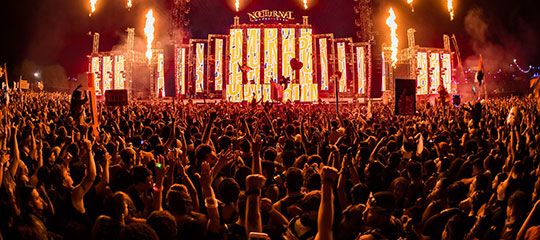 Fans with their hands in the air