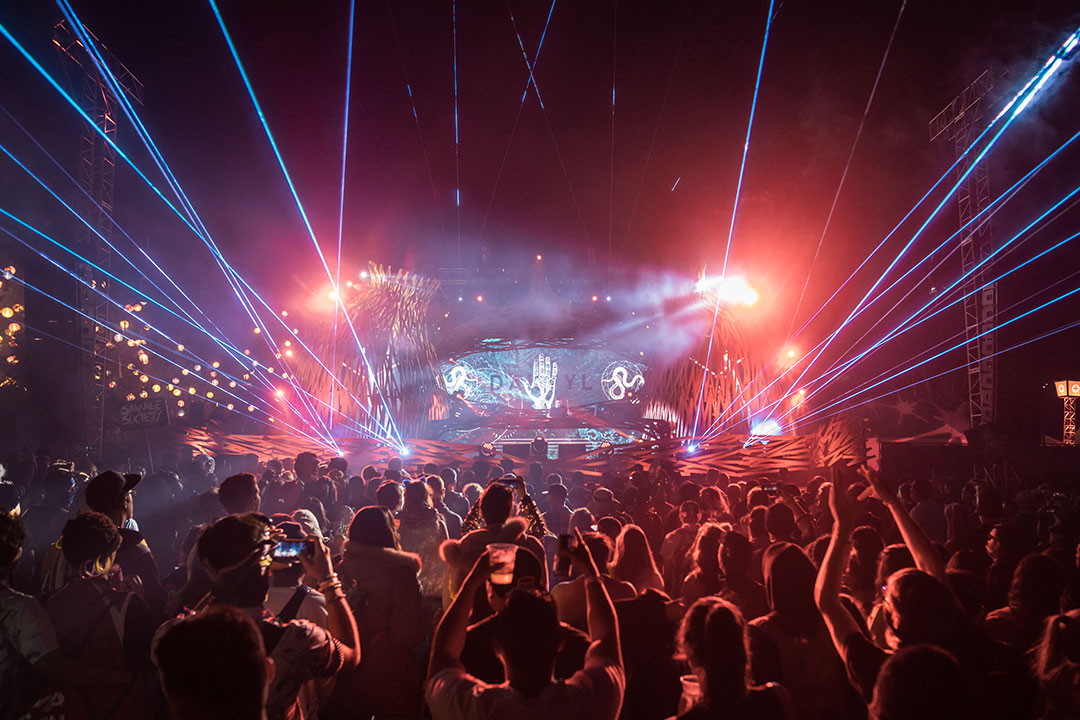 Headliners with their hands in the air at Sunken Garden