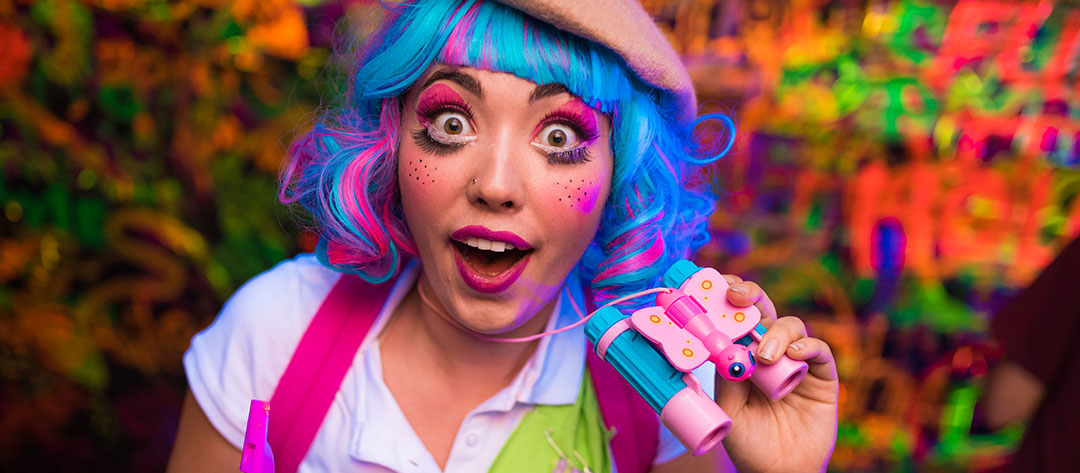 A scout performer with toy binoculars