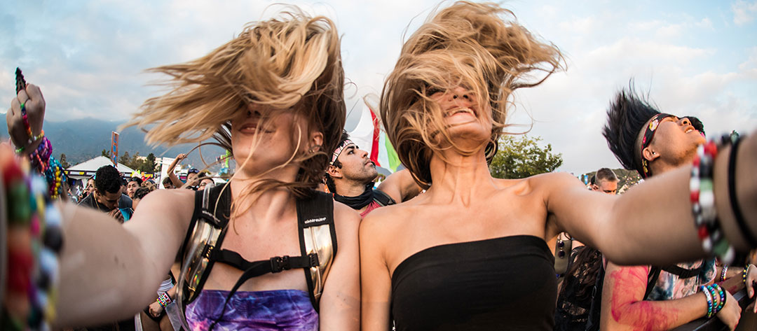 Two women headbanging