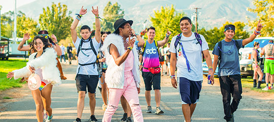 Friends walking through the campground