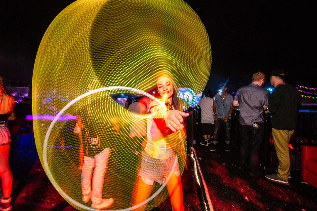 A woman with a hula hoop