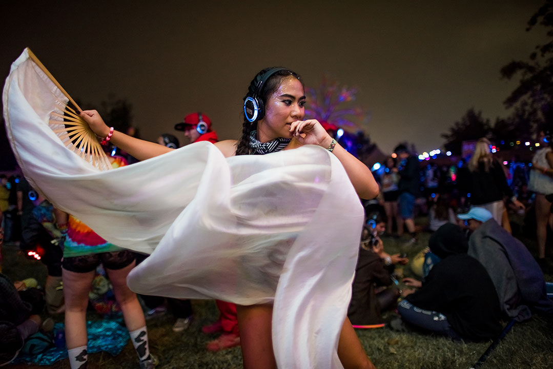 A Headliner dancing at the silent disco
