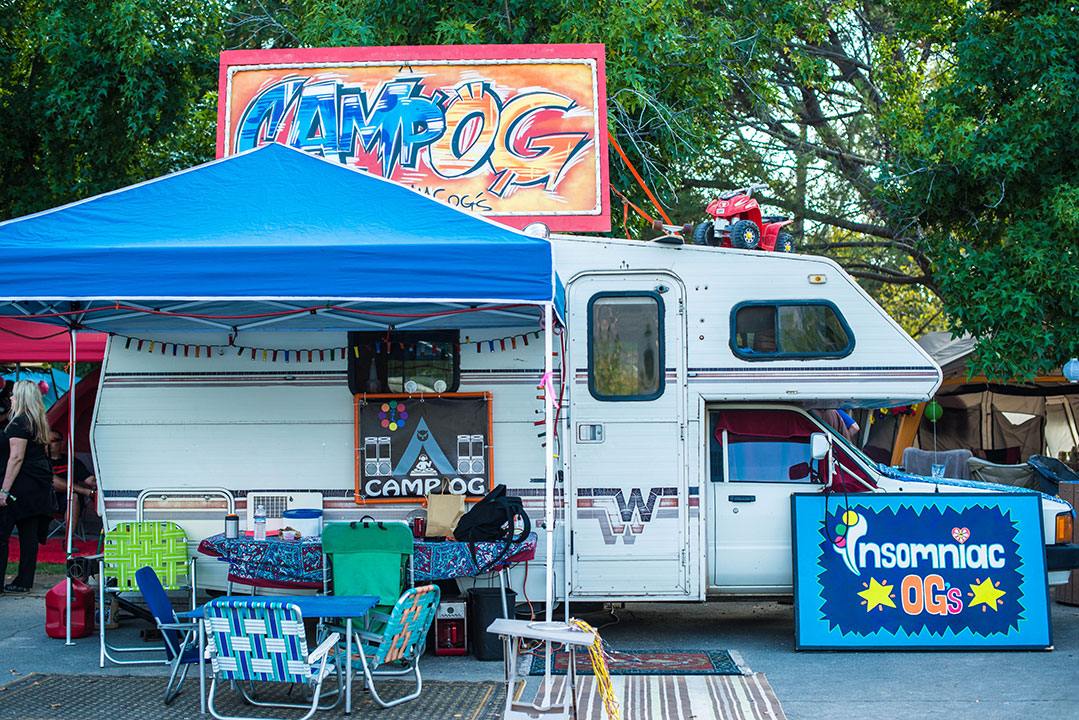 An RV camp with a "Camp OG" sign