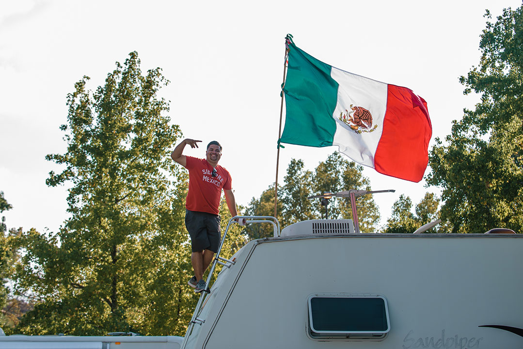 A Mexican flag over an RV