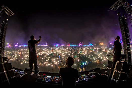 DJs standing on the decks