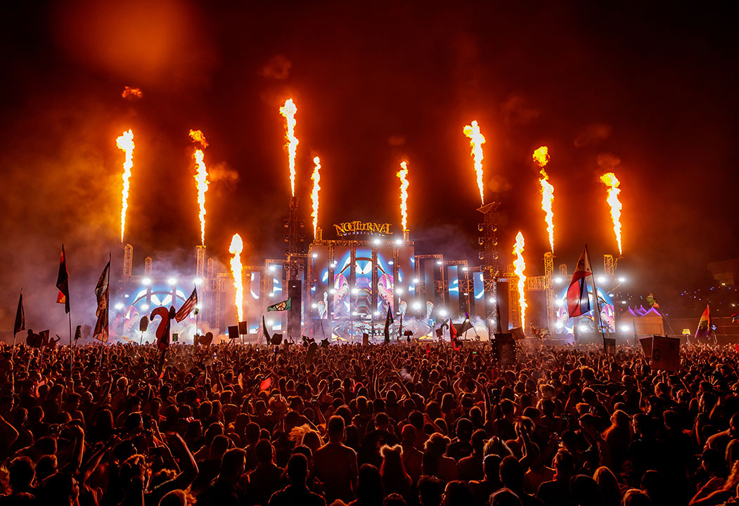 Wolves' Den stage with flame effects