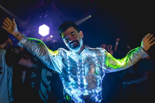 A man in a glowing suit