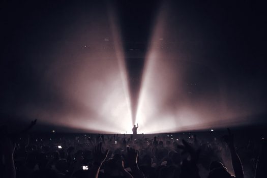 A DJ in silhouette