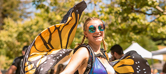 A woman in butterfly wings