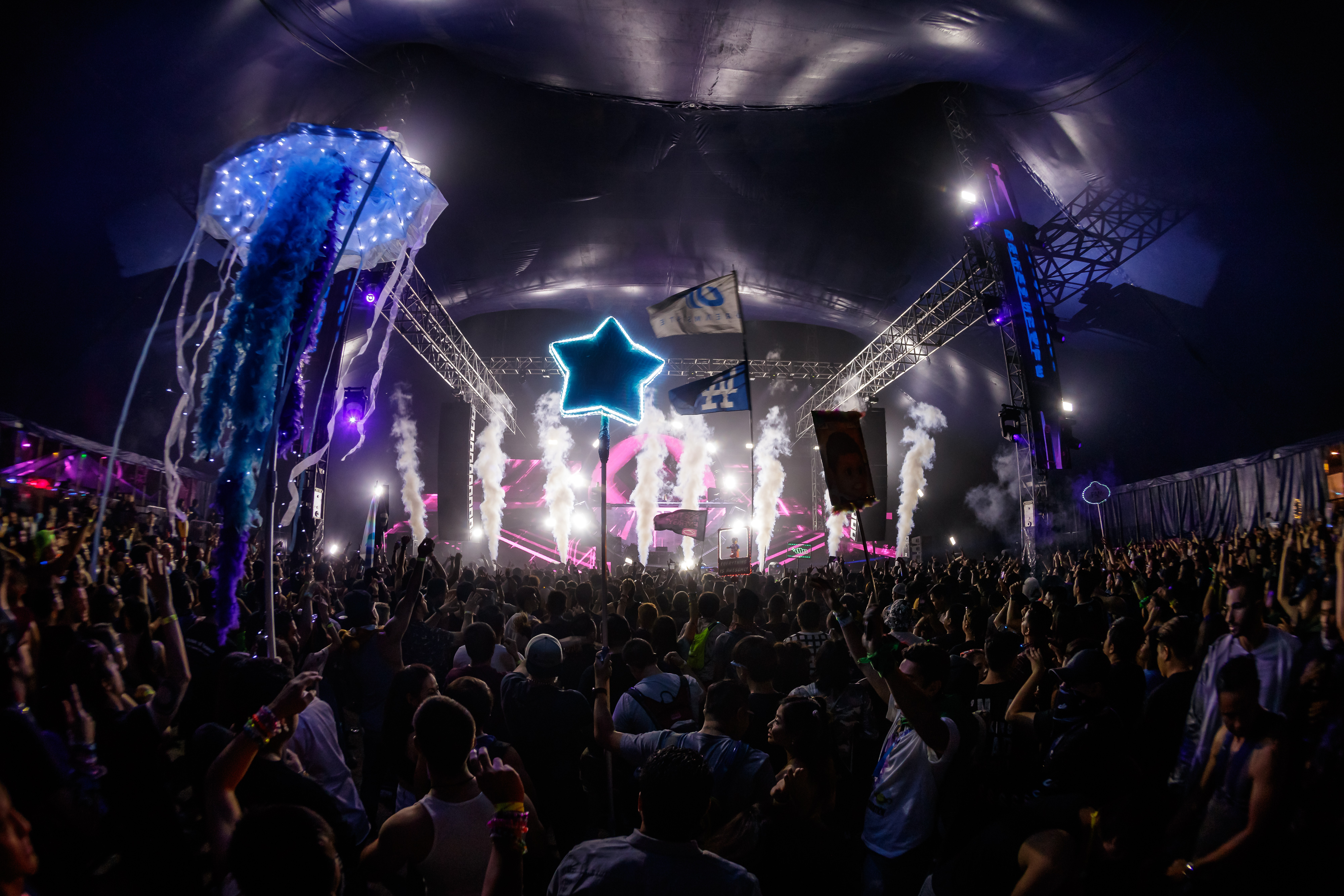 A star totem above the crowd