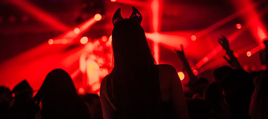 A girl with devil horns