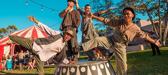 Four costumed performers