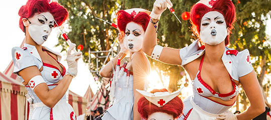 Performers dressed as scary nurses