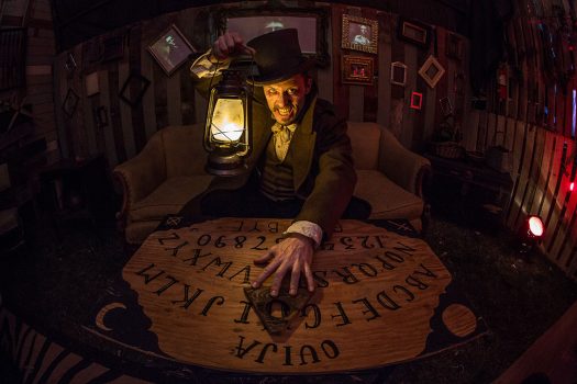 The Hatter with a Ouija board