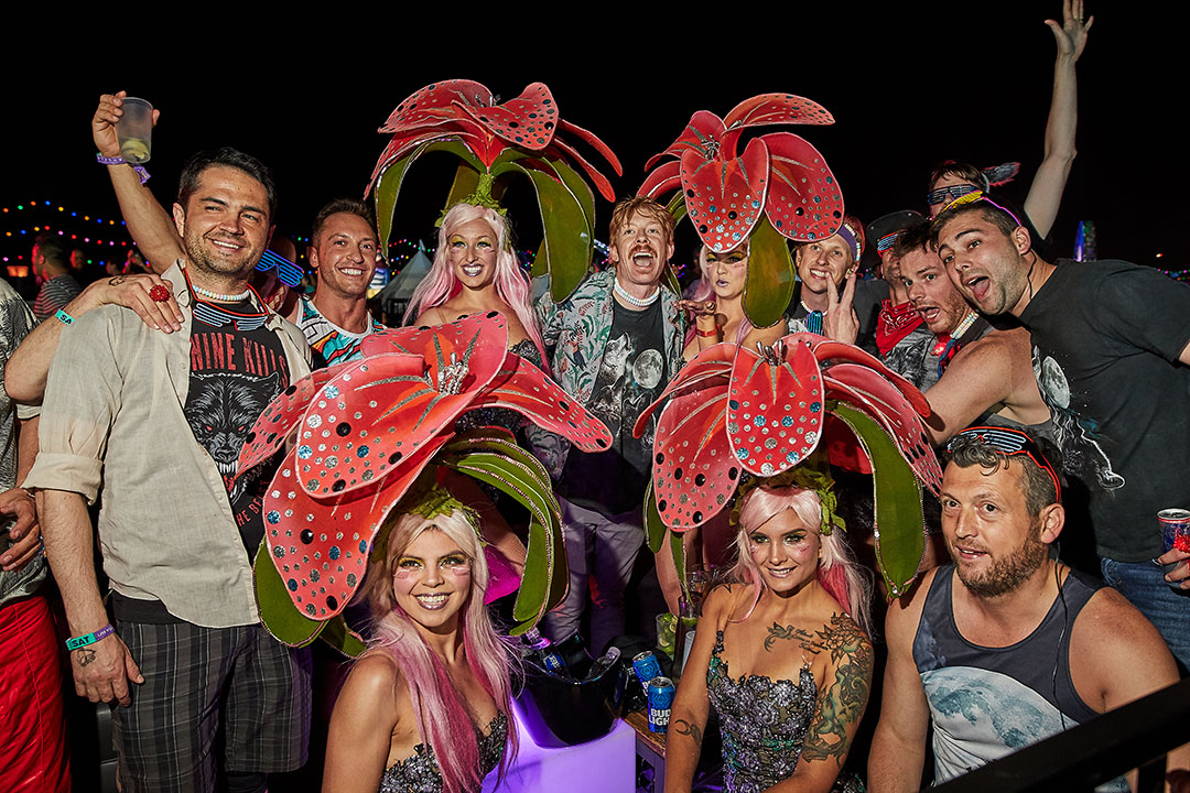 Headliners posing with performers