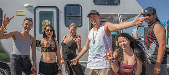 Friends in front of an RV