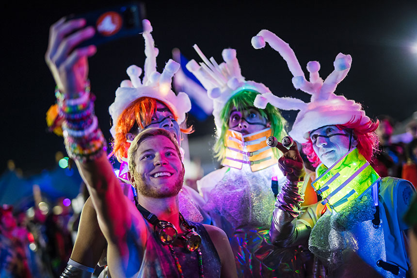 People taking a group selfie