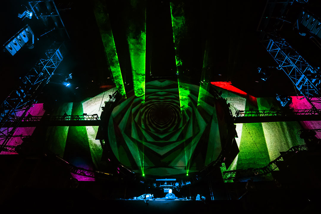A green graphic design onstage