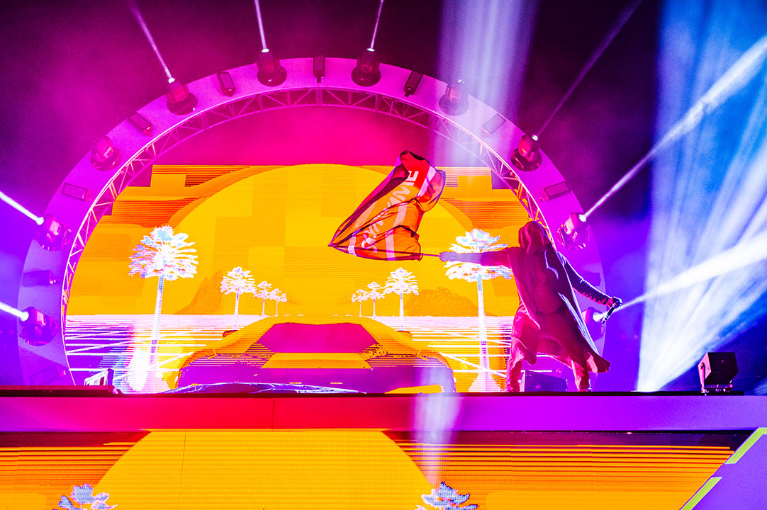 A DJ stands on the decks