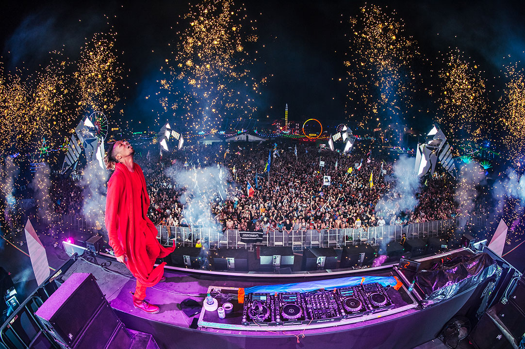 A DJ stands on the decks