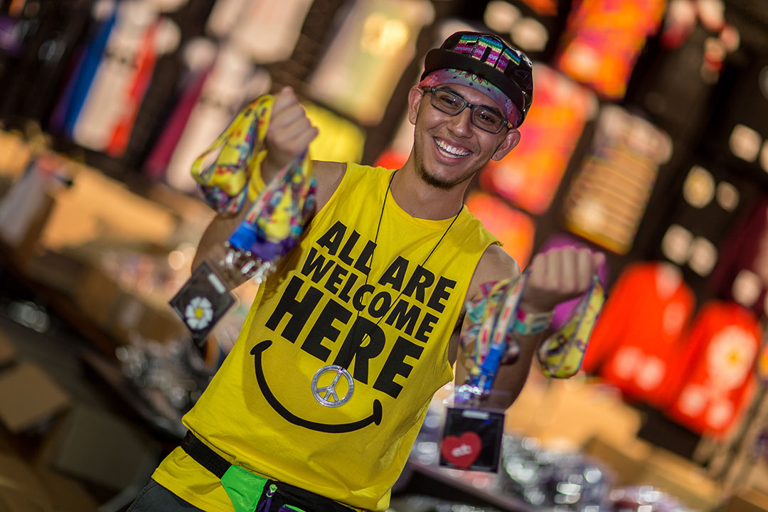 A merch guy with lanyards