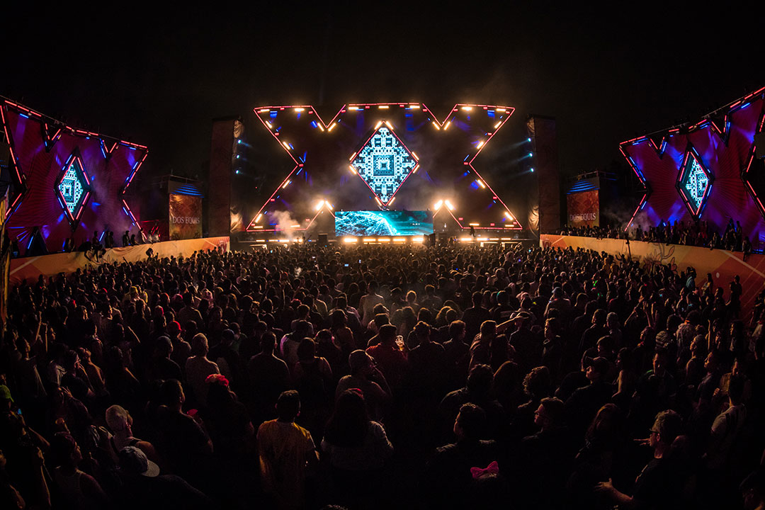 The Dos Equis stage lit up at night