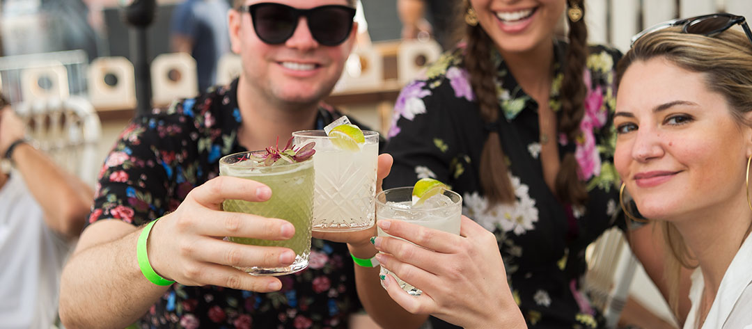 Headliners toasting cocktails