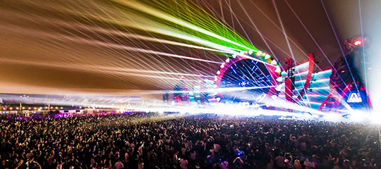 Lasers shoot from the stage