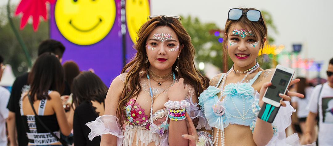 Two girls in beaded bra tops