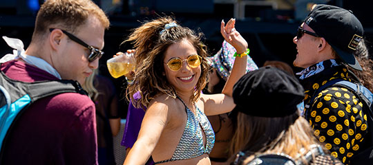 A woman dancing and smiling