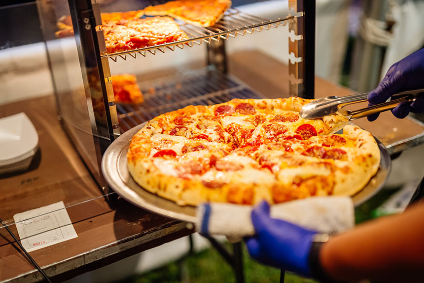 Pizza being served