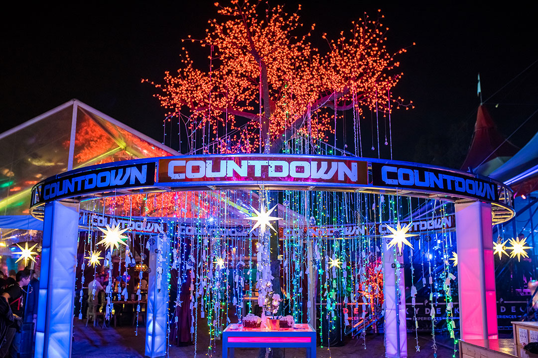 Countdown sign and a glowing tree