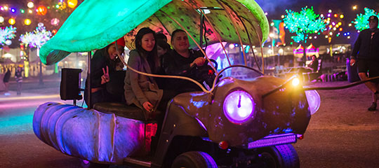 People driving an art car