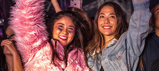Two women smiling