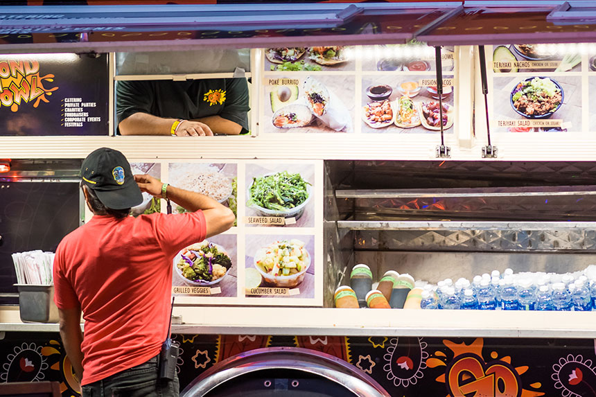 A man ordering at a food truck