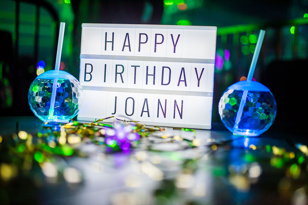 "HAPPY BIRTHDAY JOANN" sign