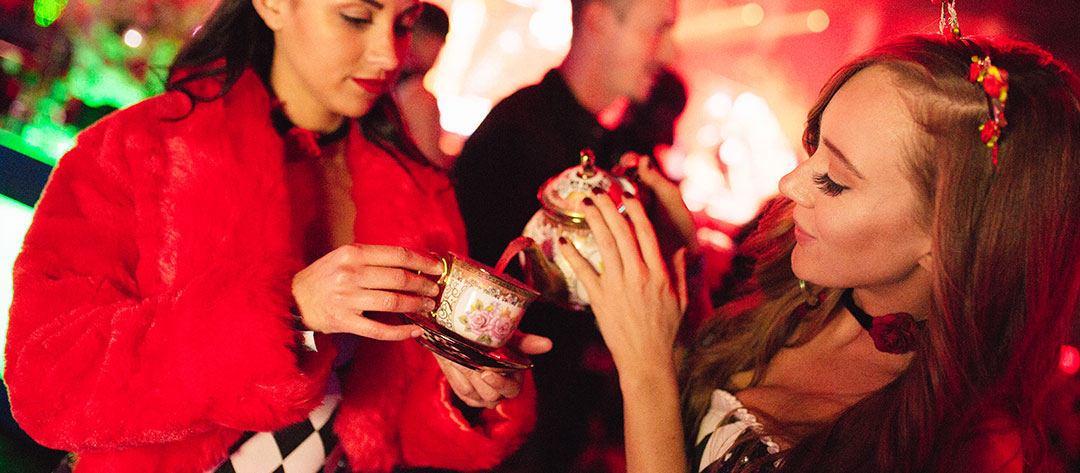 Women pouring tea