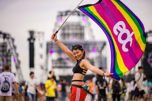 A girl with an EDC flag