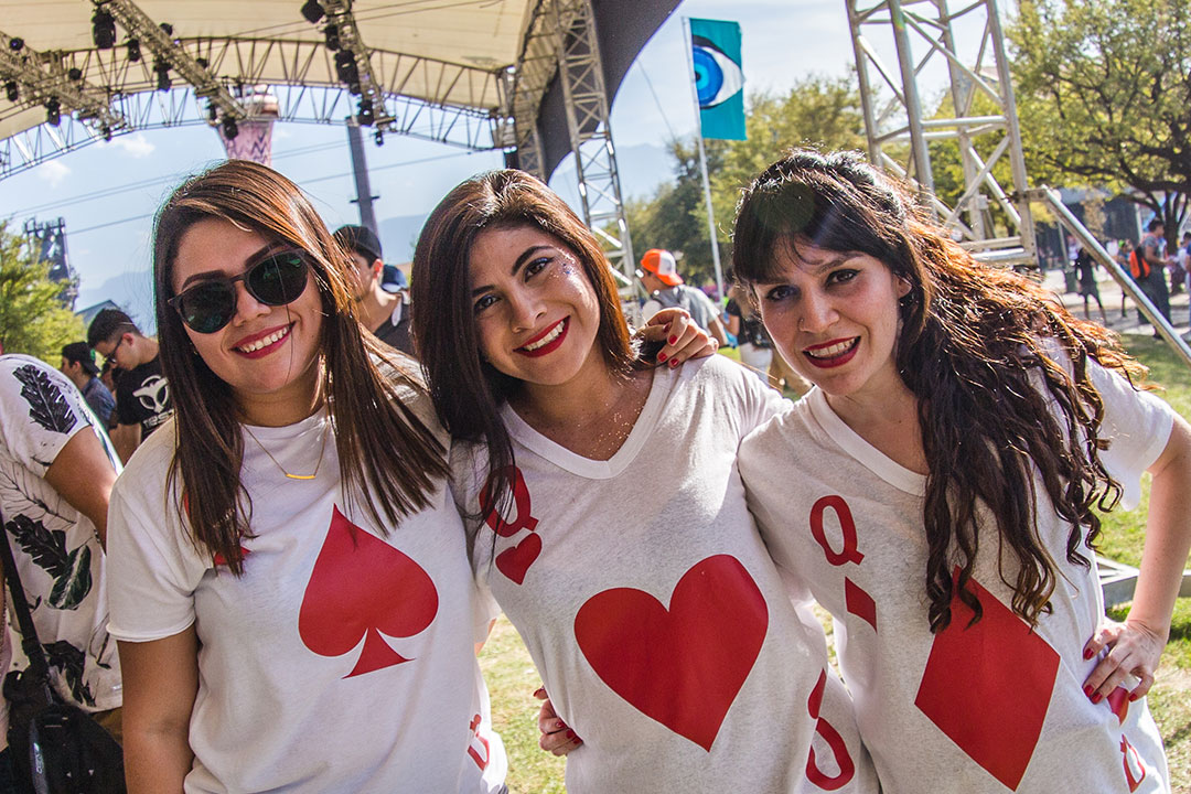 Women in playing card shirts