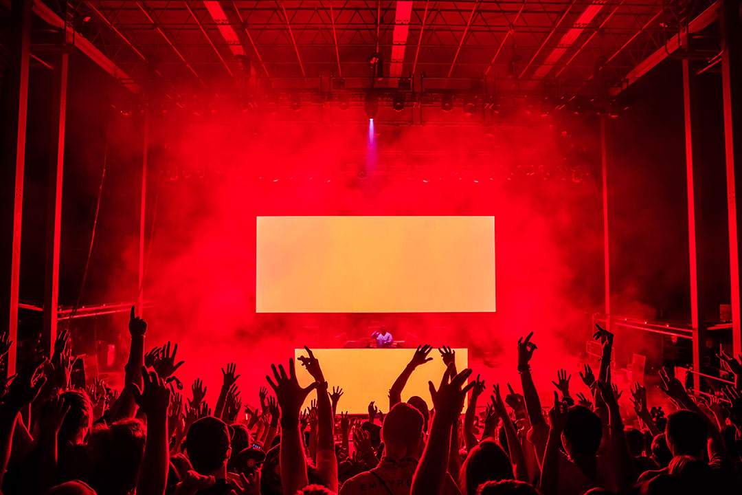 A red-lit stage