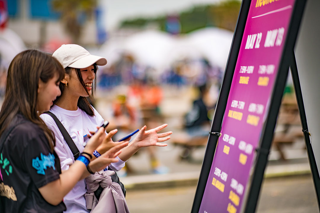 Girls reading an info board