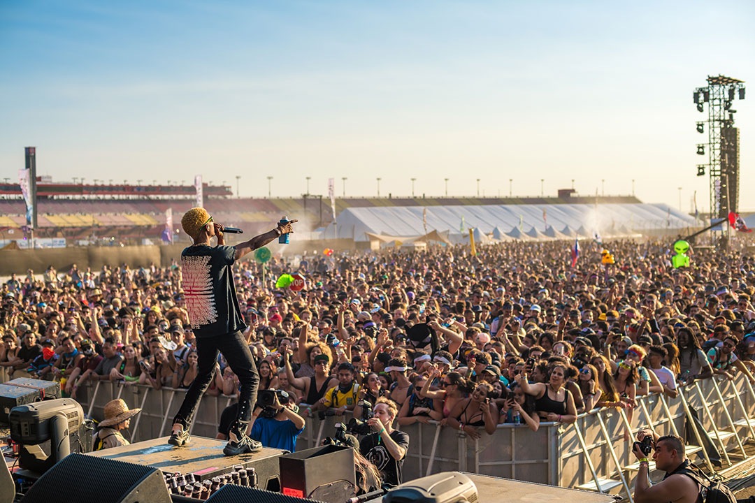 A DJ greets the crowd