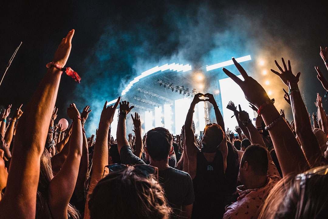 Fans with hands up