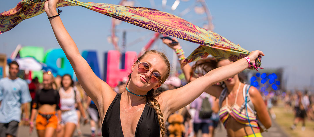 girl waving scarf in the air