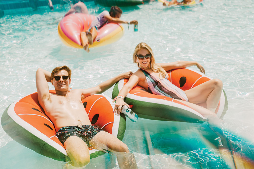 people floating in pool