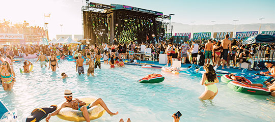 people hanging out in VIP pool