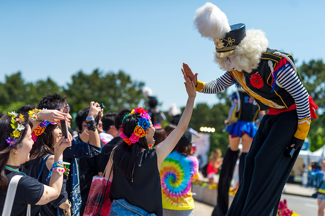 Our costumed performers are always ready with a smile and a hi-five.