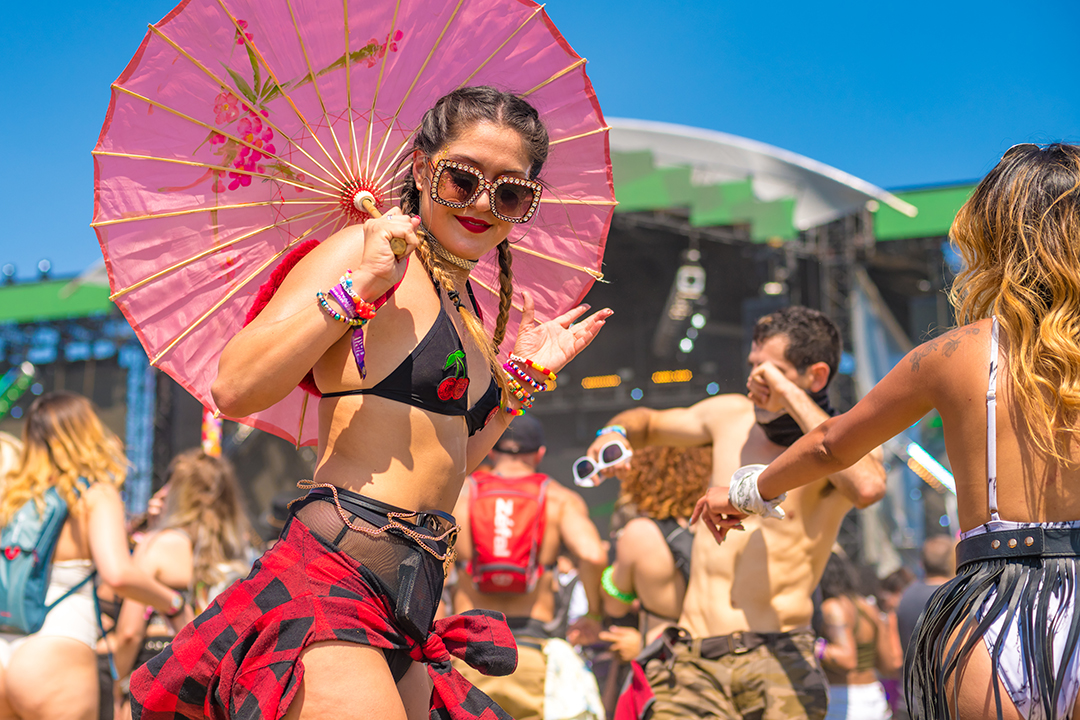 Girl with umbrella dancing