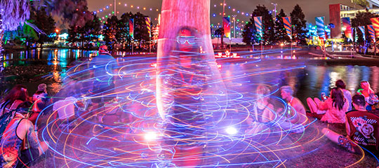 A girl spinning poi